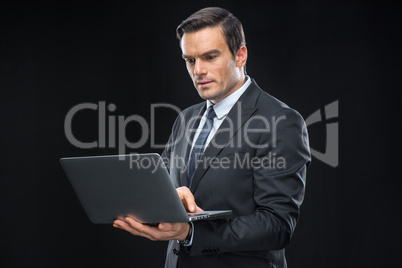 Businessman using laptop