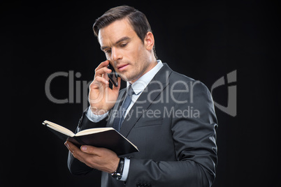 Businessman talking on smartphone