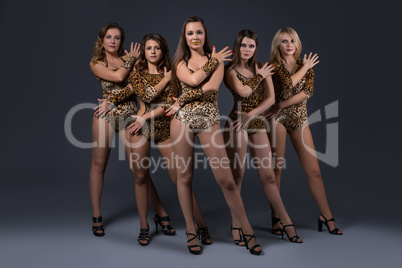 Girl dance group in sexy leopard swimsuits