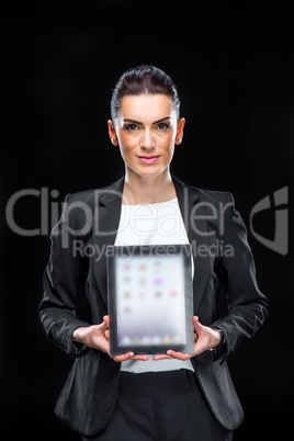 Businesswoman showing digital tablet