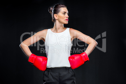 Businesswoman in boxing gloves