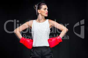 Businesswoman in boxing gloves