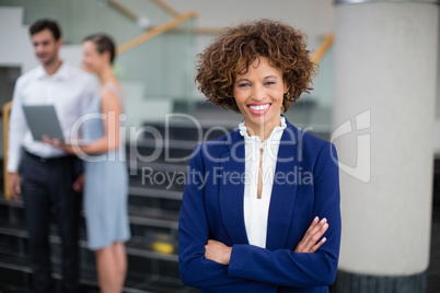 Cheerful businesswoman at conference centre