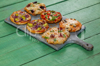 Various delicious italian pizza served on pizza tray