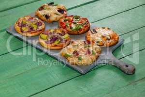 Various delicious italian pizza served on pizza tray