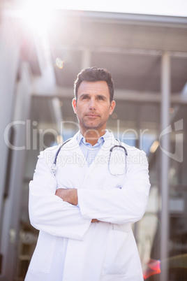 Doctor standing with arms crossed Doctor standing with arms crossed