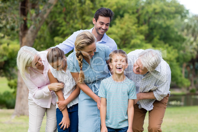 Multi-generation family enjoying together in park