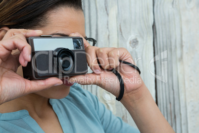 Female photographer with old fashioned camera