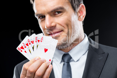 Man holding playing cards