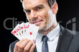 Man holding playing cards