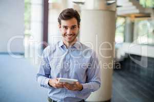 Businessman holding a digital tablet