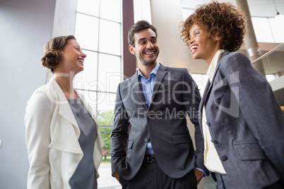 Cheerful business executives having a discussion