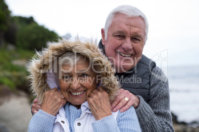 Senior couple having fun together at beach