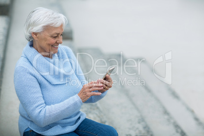 Senior woman using mobile phone