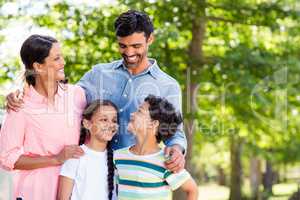 Happy family enjoying together in park