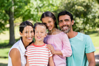 Portrait of happy family in park