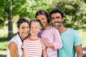 Portrait of happy family in park