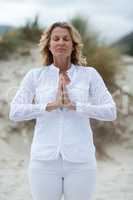 Mature woman doing meditation