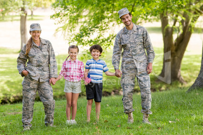 Military couple with their kids