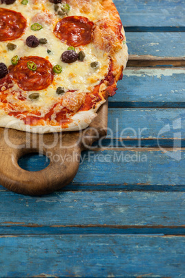 Delicious italian pizza served on pizza tray