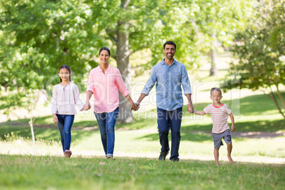 Portrait of happy family enjoying together in park Portrait of happy family enjoying together in park