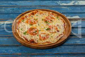 Delicious italian pizza served on pizza tray