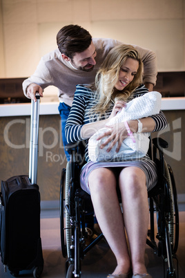 Couple holding their newborn baby