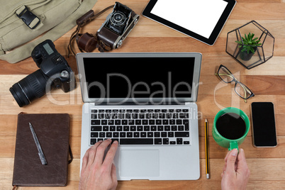 Male photographer working at desk