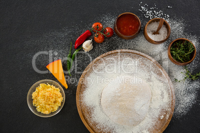 Pizza dough ball with various ingredients