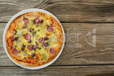 Bread dough ball on a wooden tray