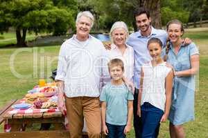 Portrait of happy family standing together