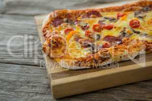 Italian pizza served on a chopping board