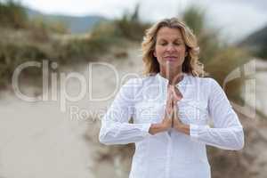 Mature woman doing meditation
