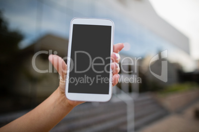 Woman holding a mobile phone