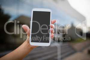 Woman holding a mobile phone