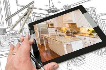 Hand on Computer Tablet Showing Photo of Kitchen Drawing Behind