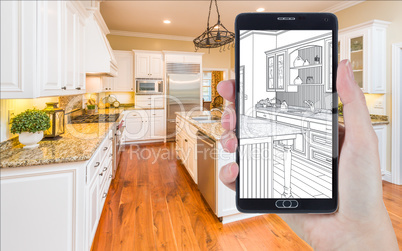 Hand Holding Smart Phone Displaying Drawing of Kitchen Photo Beh