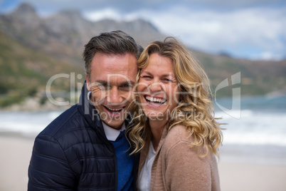 Mature couple enjoying on the beach