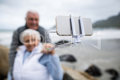 Senior couple taking a selfie from selfie stick