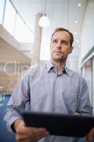 Businessman holding a digital tablet