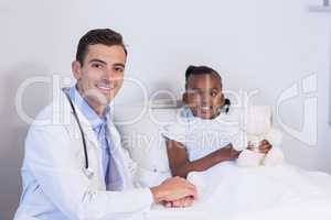 Portrait of doctor and girl patient