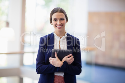 Businesswoman holding digital tablet