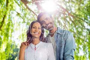 Portrait of couple smiling in park