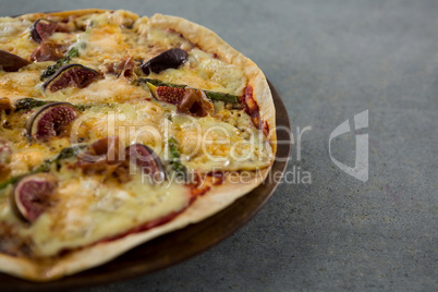 Italian pizza served on a pizza tray