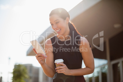 Businesswoman using mobile phone