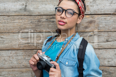 Female photographer with old fashioned camera