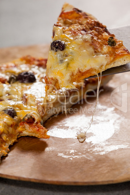 Delicious italian pizza served on pizza tray