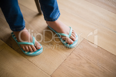 Girl in slipper at home
