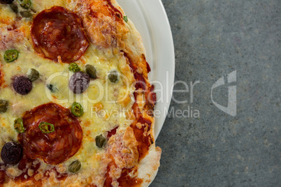 Close-up of pizza served on a pizza tray