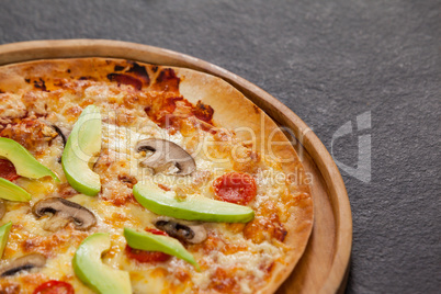 Delicious italian pizza served on pizza tray